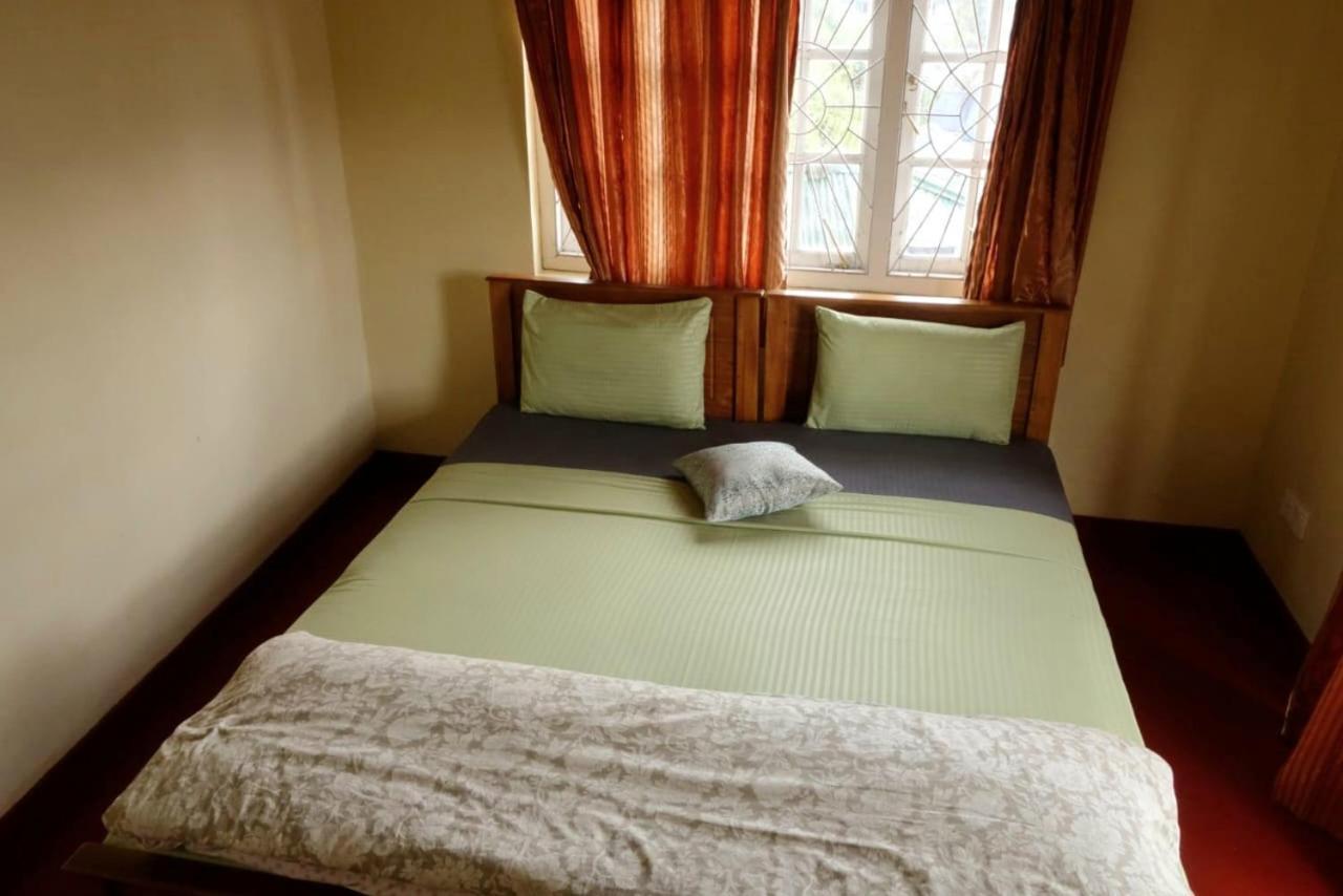 Golden King Cottage Nuwara Eliya Værelse billede